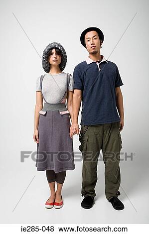 Japanese couple holding hands View Large Photo Image Stock Photo - Japanese couple holding hands. Fotosearch