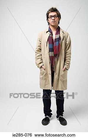 Stylish young japanese man View Large Photo Image Stock Photograph - Stylish young japanese man. Fotosearch