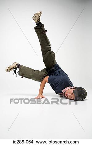 Young man breakdancing View Large Photo Image Picture - Young man breakdancing. Fotosearch