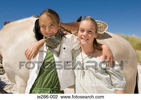 Stock Image - Portrait of two friends. Fotosearch
