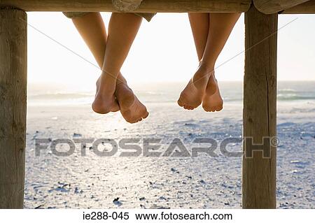 Barefeet and a pier View Large Photo Image Stock Photography - Barefeet and a pier. Fotosearch