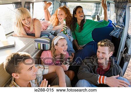 Friends in a camper van View Large Photo Image Stock Photography - Friends in a camper van. Fotosearch