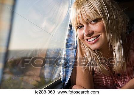 Portrait of a young woman View Large Photo Image Stock Photo - Portrait of a young woman. Fotosearch