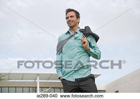 Stock Image - Businessman outdoors. Fotosearch