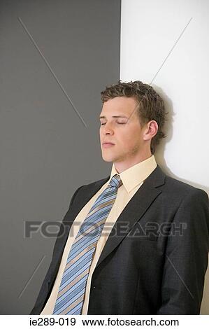 Stock Photo - Businessman with eyes closed. Fotosearch