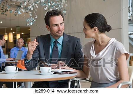 Colleagues having coffee View Large Photo Image Picture - Colleagues having coffee. Fotosearch