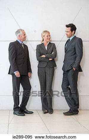 Colleagues having discussion View Large Photo Image Stock Photography - Colleagues having discussion. Fotosearch