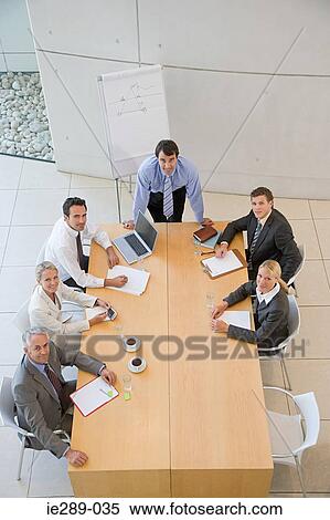 Colleagues in meeting View Large Photo Image Stock Photography - Colleagues in meeting. Fotosearch