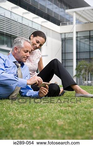 Colleagues outdoors View Large Photo Image Picture - Colleagues outdoors. Fotosearch