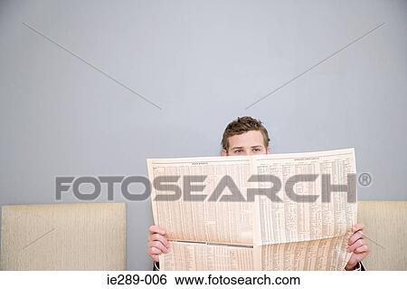 Man reading newspaper View Large Photo Image Stock Photograph - Man reading newspaper. Fotosearch