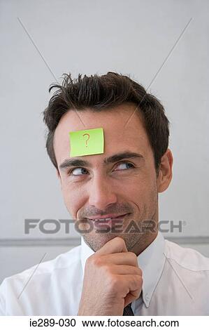 Man with question mark on his forehead View Large Photo Image Stock Image - Man with question mark on his forehead. Fotosearch