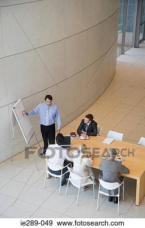 Stock Photo - People in presentation. Fotosearch