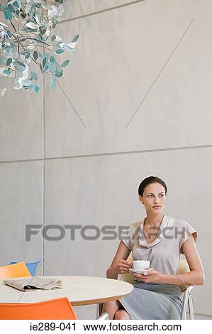 Woman having coffee View Large Photo Image Stock Image - Woman having coffee. Fotosearch