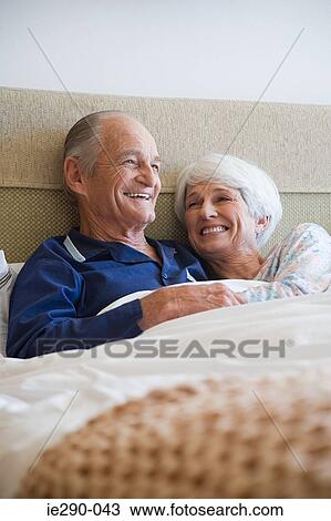 A senior couple in bed View Large Photo Image Stock Image - A senior couple in bed. Fotosearch