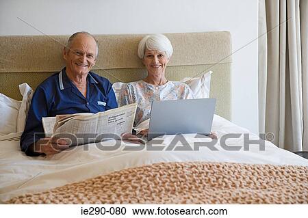 A senior couple in bed View Large Photo Image Stock Image - A senior couple in bed. Fotosearch