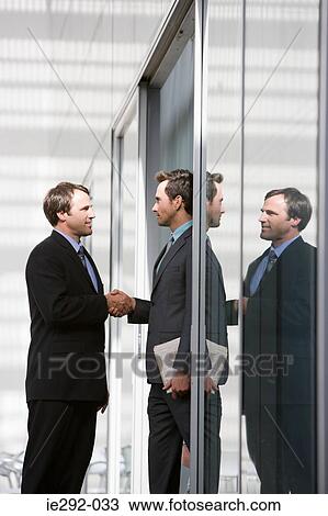 Businessmen shaking hands View Large Photo Image Stock Image - Businessmen shaking hands. Fotosearch