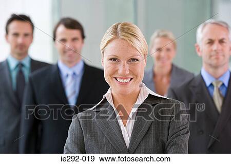 Businesswoman with colleagues View Large Photo Image Stock Photo - Businesswoman with colleagues. Fotosearch