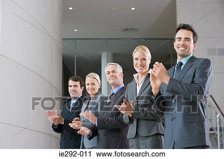 Colleagues clapping View Large Photo Image Stock Image - Colleagues clapping. Fotosearch