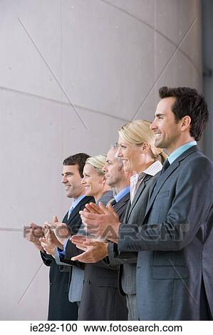 Colleagues clapping View Large Photo Image Stock Image - Colleagues clapping. Fotosearch