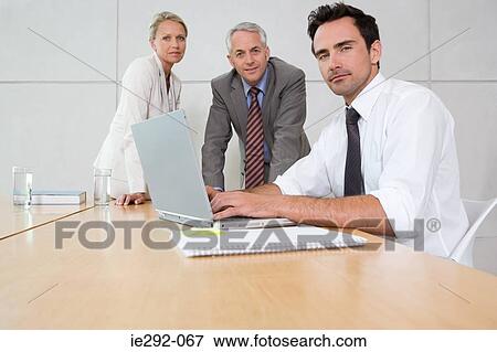 Colleagues in a meeting View Large Photo Image Stock Photo - Colleagues in a meeting. Fotosearch