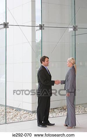 Colleagues shaking hands View Large Photo Image Stock Image - Colleagues shaking hands. Fotosearch