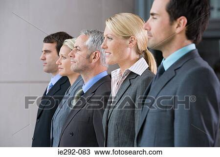Five businesspeople in a row View Large Photo Image Stock Image - Five businesspeople in a row. Fotosearch