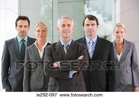 Five businesspeople in a row View Large Photo Image Stock Photo - Five businesspeople in a row. Fotosearch