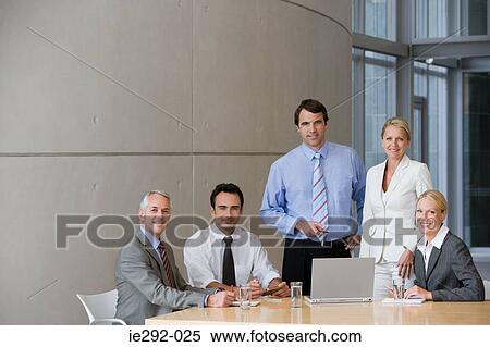 Five colleagues in a meeting View Large Photo Image Stock Photography - Five colleagues in a meeting. Fotosearch