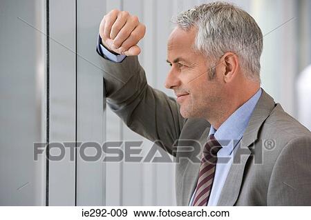 Profile of a mature businessman View Large Photo Image Stock Photo - Profile of a mature businessman. Fotosearch