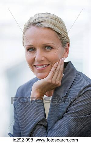 Smiling businesswoman View Large Photo Image Stock Photo - Smiling businesswoman. Fotosearch