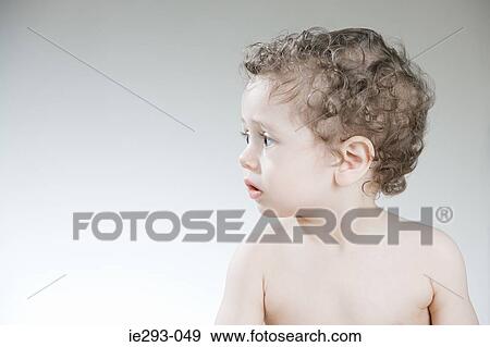 Profile of a baby boy View Large Photo Image Stock Photo - Profile of a baby boy. Fotosearch
