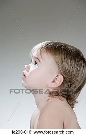 Profile of a baby girl View Large Photo Image Stock Photograph - Profile of a baby girl. Fotosearch