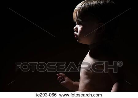 Stock Photograph - Profile of a baby girl. Fotosearch