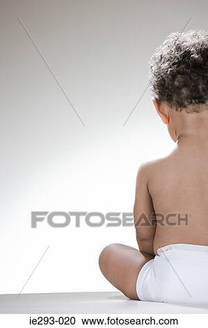 Rear view of a baby boy View Large Photo Image Stock Image - Rear view of a baby boy. Fotosearch