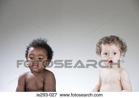 Two baby boys View Large Photo Image Stock Photo - Two baby boys. Fotosearch