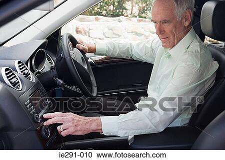 Man using global positioning system View Large Photo Image Stock Image - Man using global positioning system. Fotosearch