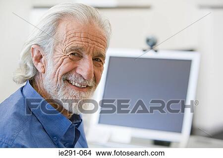 Picture - Senior man and computer. Fotosearch
