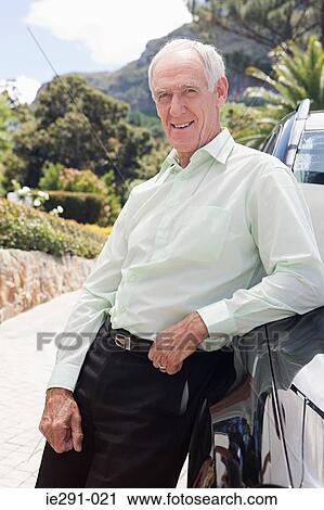 Senior man with car View Large Photo Image Stock Image - Senior man with car. Fotosearch