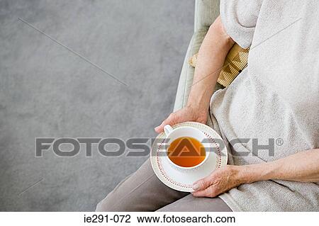 Woman with tea View Large Photo Image Stock Image - Woman with tea. Fotosearch