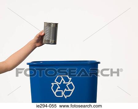 Boy recycling a tin can View Large Photo Image Stock Photography - Boy recycling a tin can. Fotosearch