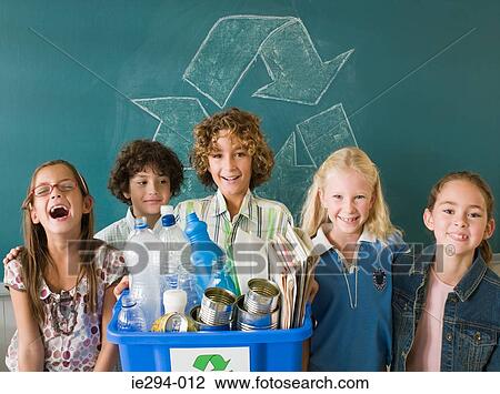 Children with a recycling bin View Large Photo Image Stock Image - Children with a recycling bin. Fotosearch