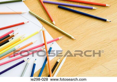 Stock Photo - Coloured pencils and paper. Fotosearch