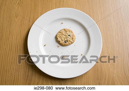 Cookie on a plate View Large Photo Image Stock Image - Cookie on a plate. Fotosearch