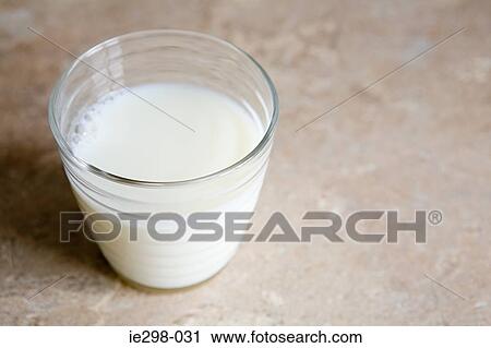 Stock Image - Milk in a glass. Fotosearch