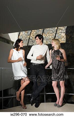 Friends at a party View Large Photo Image Stock Image - Friends at a party. Fotosearch