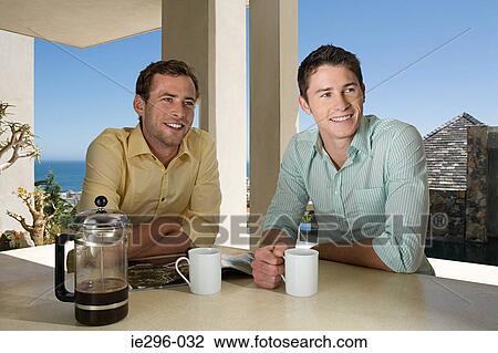 Friends having coffee View Large Photo Image Stock Image - Friends having coffee. Fotosearch