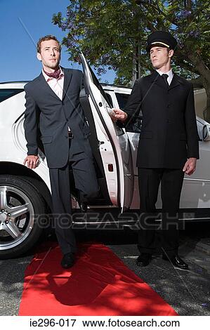Man stepping on red carpet View Large Photo Image Stock Photo - Man stepping on red carpet. Fotosearch