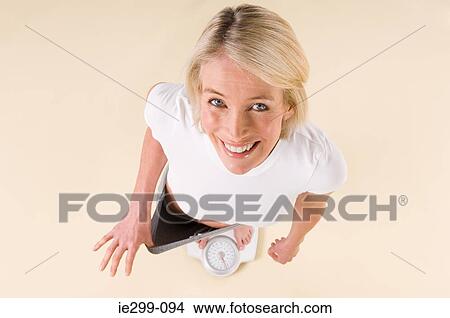 Portrait of a woman who has lost weight View Large Photo Image Picture - Portrait of a woman who has lost weight. Fotosearch