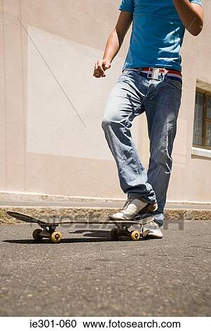 A skateboarder View Large Photo Image Stock Image - A skateboarder. Fotosearch