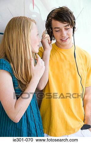 A teenage boy and girl View Large Photo Image Stock Image - A teenage boy and girl. Fotosearch